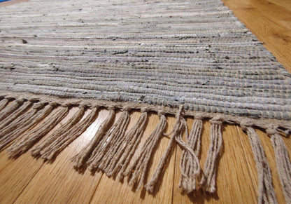 Handwoven Neutral Area Rug with Fringe
