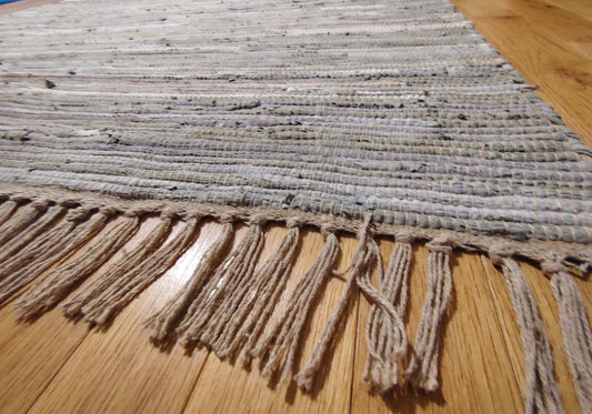 Handwoven Neutral Area Rug with Fringe