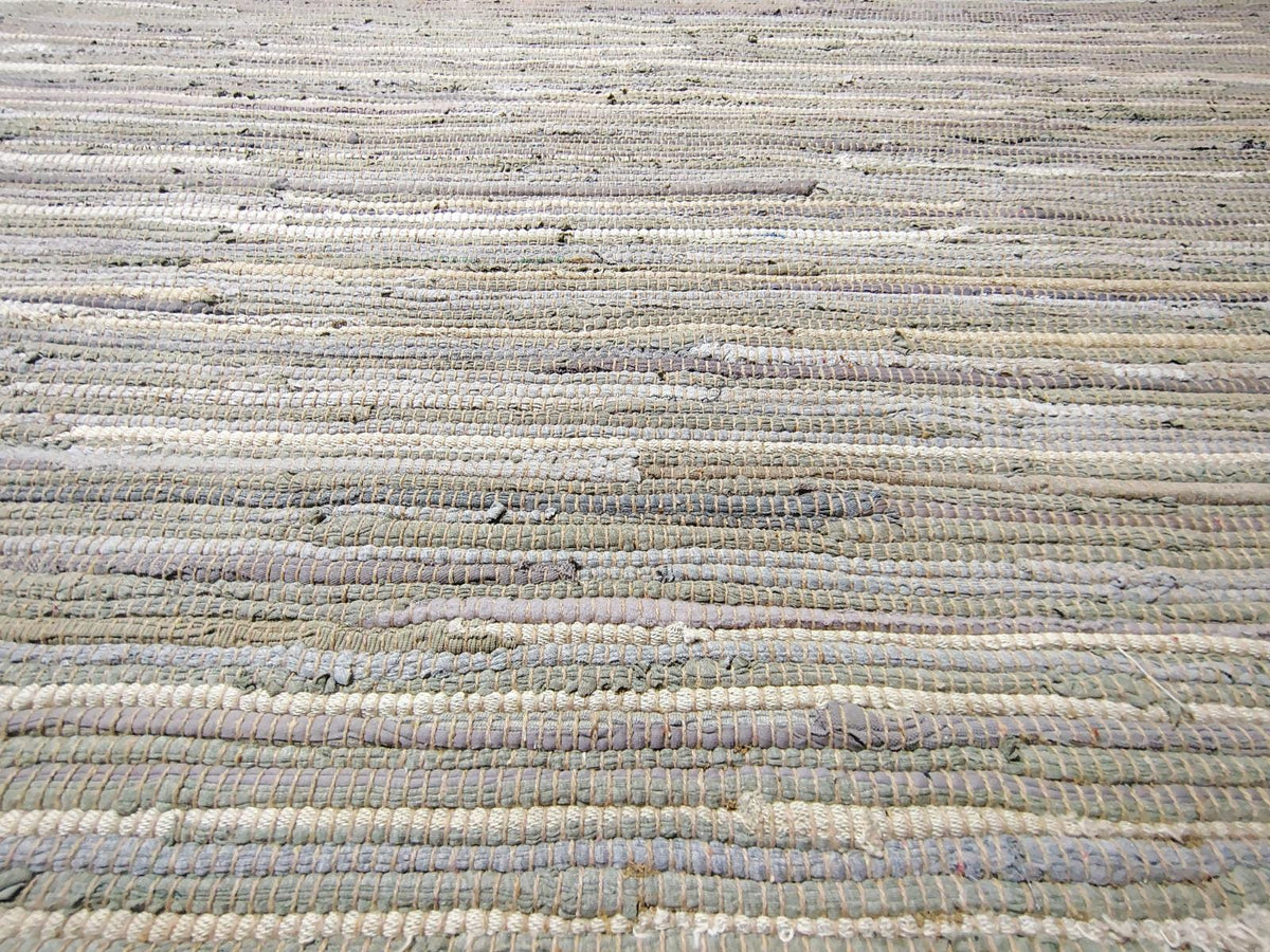 Handwoven Neutral Area Rug with Fringe