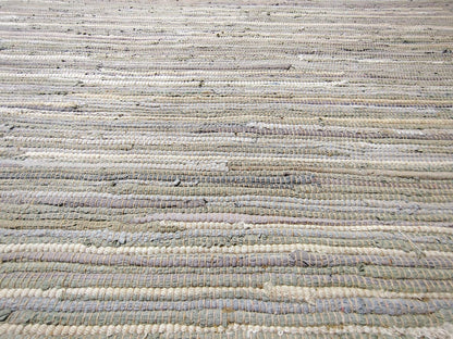 Handwoven Neutral Area Rug with Fringe